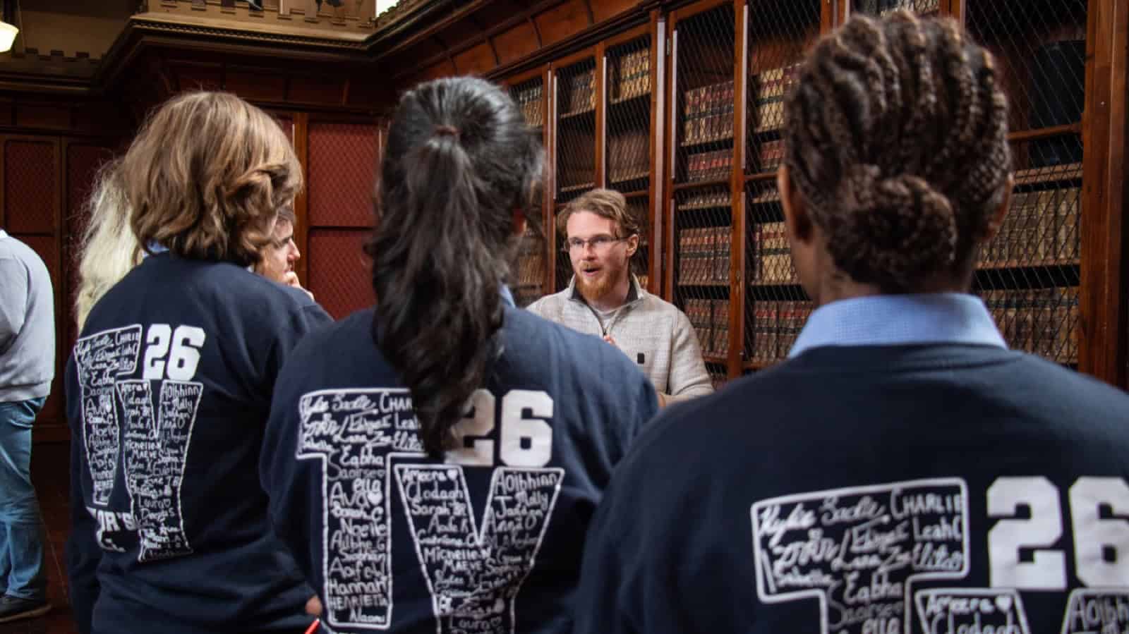A mentor talking with Transition Year students in the UCC library at the Future Leaders of Screen event